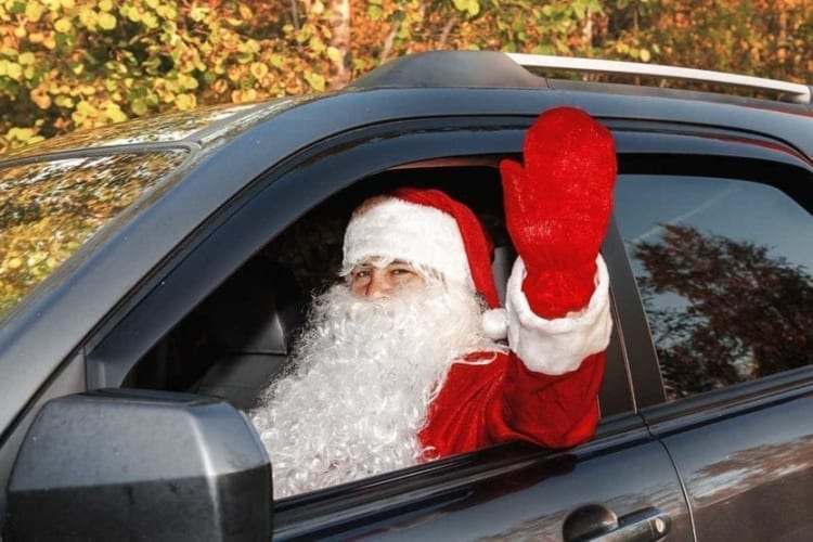 Santa Claus sitting in a car